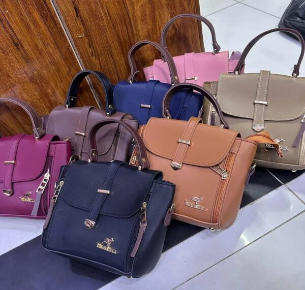Ladies & Teenagers Rexene Shoulder Handbags -Color Maroon